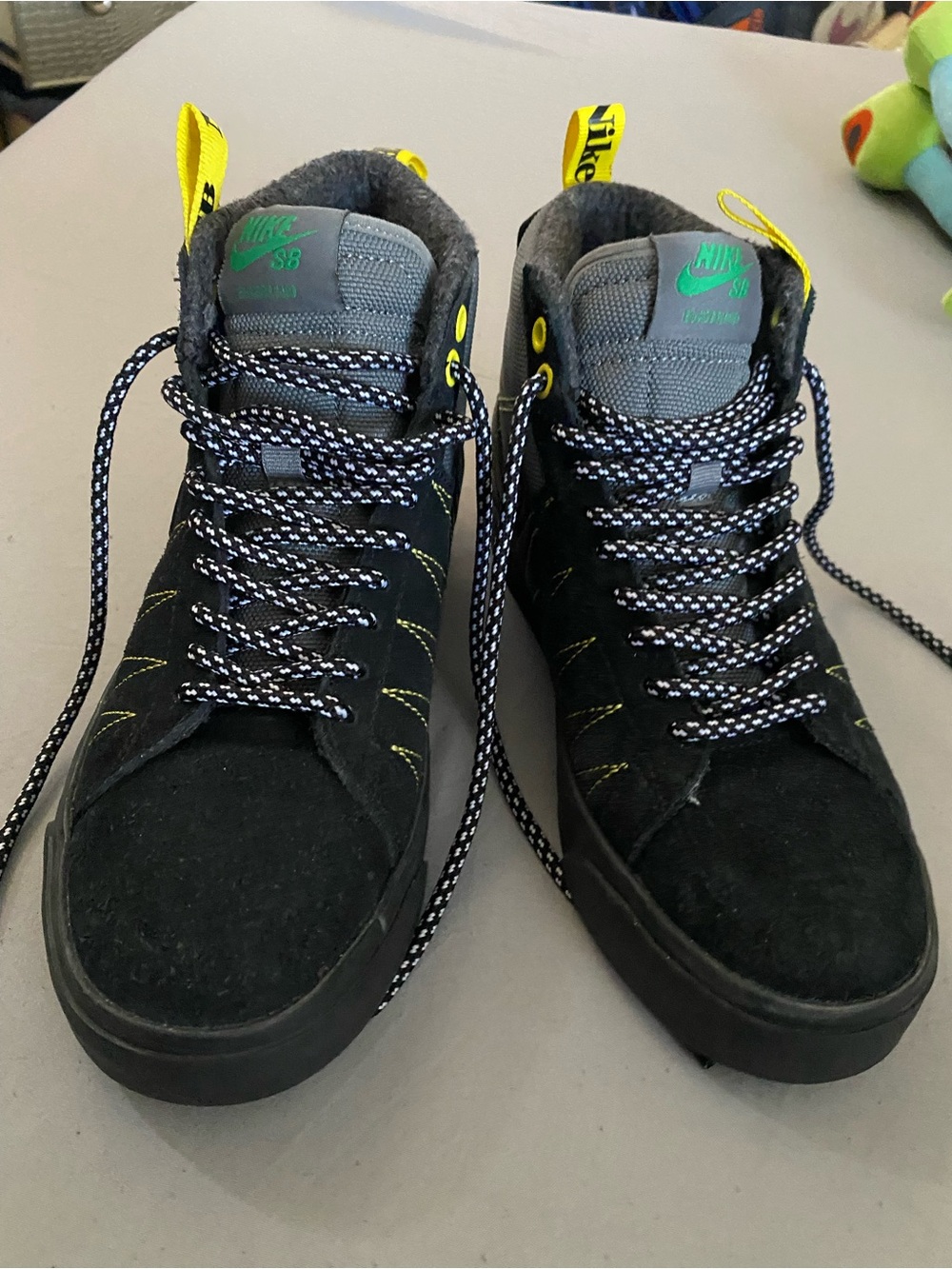 Black Suede High-Top Sneakers with Yellow and Green Accents
